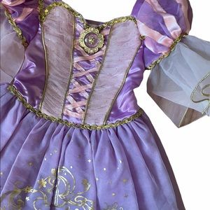 Official Disney Rapunzel dress.